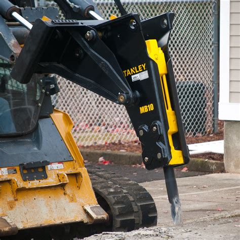 skid steer with concrete breaker and bucket|breaker attachment for skid steer.